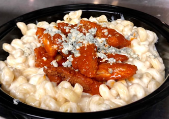 buffalo chicken mac & cheese piled high with tenders and crumbled blue cheese